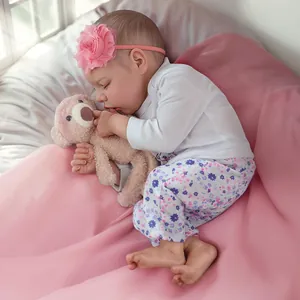 16-inch lifelike reborn sleeping baby girl doll with floral headband and plush toy