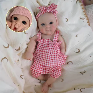 Realistic 12-inch reborn baby doll in red plaid outfit with lifelike skin and blue eyes