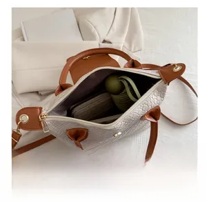 Top view of woven tote bag interior showing capacity for umbrella and wallet