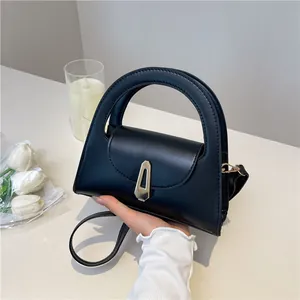 Classic black semi-circle handbag with silver geometric lock and sleek handle