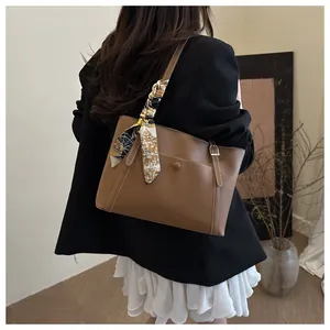 Brown PU leather tote bag with vintage scarf handle and magnetic outer pocket detail