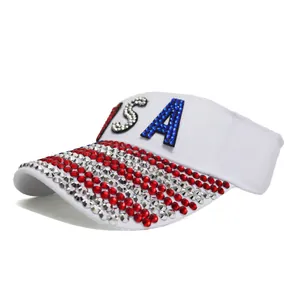 Detailed macro of the USA letter logo in blue and white rhinestones on the white sun visor