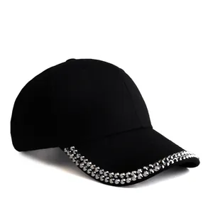 Black cotton baseball cap with silver rhinestone studs on the brim for women