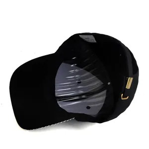 Detail view of cotton baseball cap interior with rhinestone brim and adjustable buckle