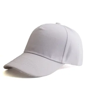Detail view of a white five-panel cotton baseball cap with reinforced curved visor