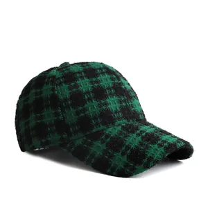 Women's autumn plaid baseball cap in green and black tweed fabric, stylish outdoor hat