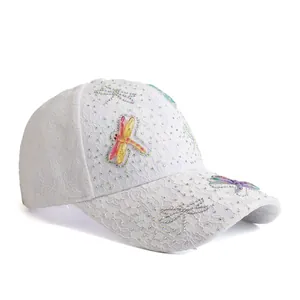 Breathable white lace baseball cap with iridescent dragonflies and rhinestone accents
