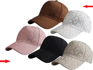 Detail view of M-letter rhinestone patterns on multi-color baseball caps