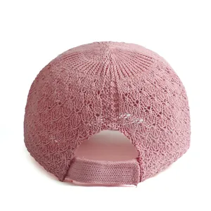 Breathable pink knit baseball cap for women featuring hollow crochet mesh and back strap