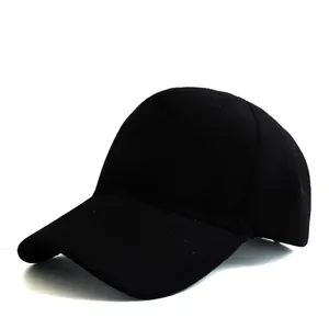 Detail view of a black five-panel baseball cap with curved brim and durable fabric