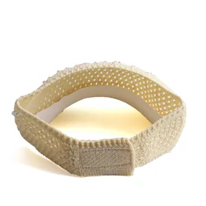 Women's beige knitted sun visor hat with hollow diamond mesh and rhinestone details