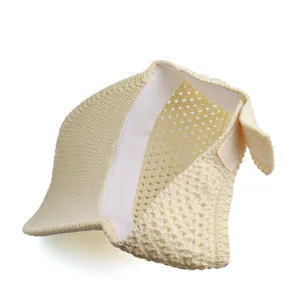 Close-up of cream knitted open top sun hat showing breathable mesh and velcro strap