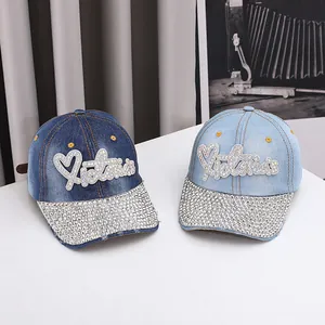 Berretti da baseball in denim con strass e scritta Victoria in blu e azzurro