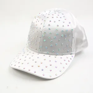 Detail of white satin baseball cap with AB iridescent rhinestones and shimmering crystals