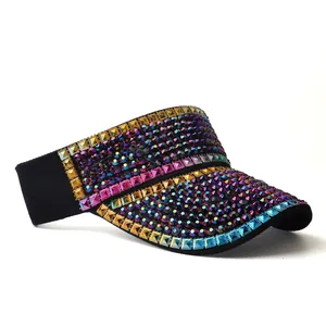 Women's sun visor hat featuring colorful rhinestones and gold studs on black fabric
