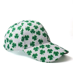 Fashionable white baseball cap with green clover print for women shown from a 45-degree angle