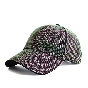Macro detail of vibrant iridescent rhinestones fully covering a black baseball cap