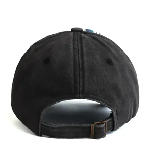 Rear view of washed charcoal baseball cap with adjustable metal buckle and floral design