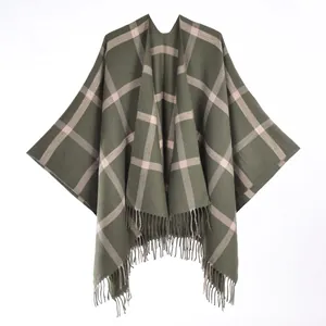 Plaid cashmere-like shawl poncho in dark green and pink with fringe detail