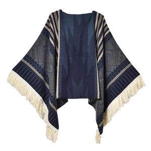 Ethnic pullover poncho with geometric jacquard pattern and long cream tassels