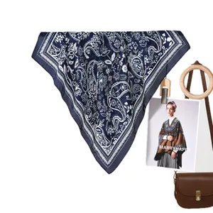 Classic navy blue Paisley silk square scarf with vintage white floral pattern and leather bag