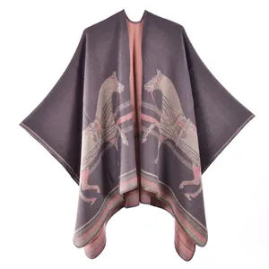 Elegant thick knit poncho shawl for women in grey and pink with symmetric horse pattern