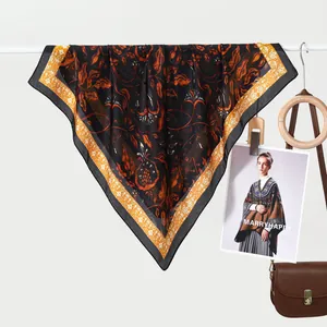 Classic floral silk scarf in black and orange with vintage vine patterns and fine edges