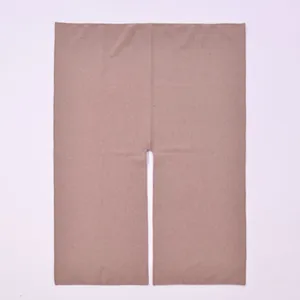 Detailed macro view of high-quality light brown cashmere blend shawl knit fabric