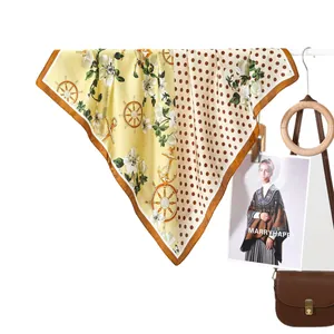Classic polka dot silk scarf with floral and nautical motifs in yellow and beige colors