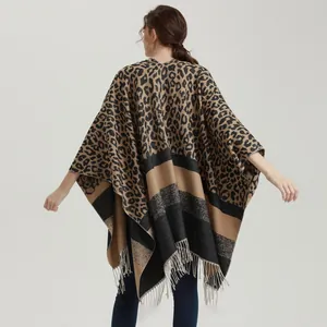 Women's leopard print knit poncho shawl with fringe tassels for autumn winter fashion