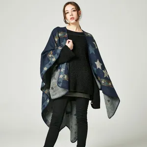 Detail of star pattern cashmere-like shawl showing thick texture and warm knit drape