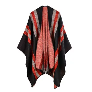 Ethnic style knitted shawl with geometric patterns in red black and gray tones