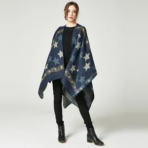 Detail of navy blue cashmere-feel shawl featuring star patterns and ethnic geometric borders