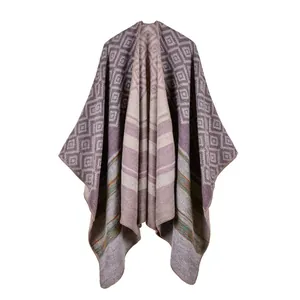Detailed view of purple and grey knitted shawl with geometric rhombus patterns