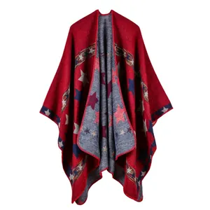 Detail shot of ethnic wine red starry shawl showing thick cashmere-like knit texture