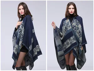 Detail of floral knit shawl with navy and gray stitching and hand-sewn edge for warmth