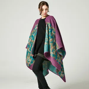 Detail of camouflage cashmere shawl featuring purple and teal jacquard knitting pattern