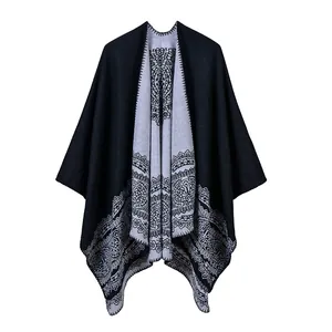 Women's classic shawl cape with mandala lace pattern and thick knit texture