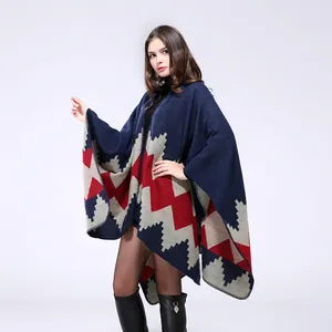 Aztec patterned knit poncho cape with geometric jacquard in navy blue and red