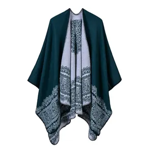 Classic green women's shawl cape with intricate mandala pattern and grey inner lining