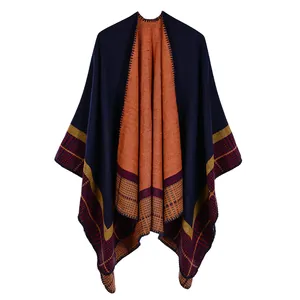 Navy and orange double-sided knitted shawl with geometric patterns and soft fringes