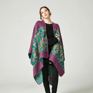 Women's stylish camouflage jacquard knit poncho cape in purple and cyan tones