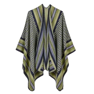 Women's faux cashmere poncho wrap with green and grey geometric plaid stripe patterns