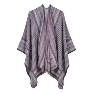 Purple cashmere-like knit shawl with striped geometric patterns and split cape design