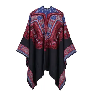 Close-up of ethnic geometric pattern and knit texture on heavy open-front shawl