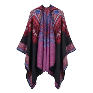 Close-up of ethnic jacquard knit shawl showing colorful patterns and stitched edges