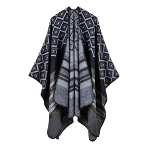 Women's cashmere-like shawl with black and grey geometric patterns and striped design