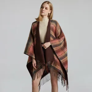Classic plaid shawl wrap with tassels for women, featuring orange and brown tartan pattern