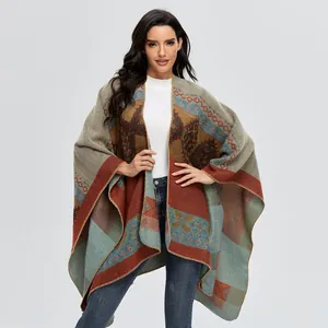 Bohemian style knitted shawl cape with vintage geometric patterns and blanket texture