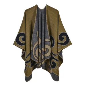 Detail of double-sided knit shawl with olive green and grey spiral patterns